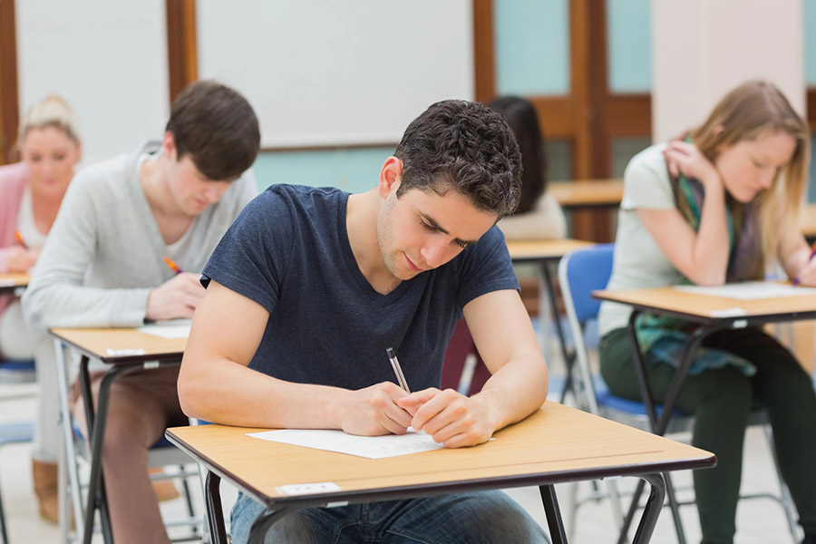 Students taking a test in a classroom in Akron